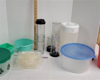 Plastic kitchen tubs, pitcher, strainer, cushion art cylinder.