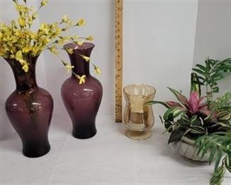 4 Decorative vases with faux flowers.