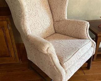 One of a pair of wing chairs