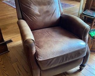 One of a pair of Legget and Platt leather recliners