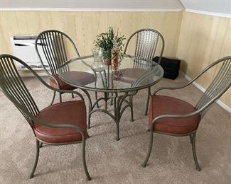 Metal and glass round table and 4 chairs