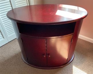 Oval media cabinet or table