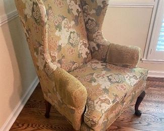 One of a pair of wing chairs 