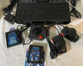 Black Atari 2600 With Games Controller Paddles  