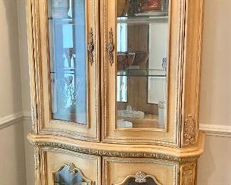 $700  Dramatic display cabinet 86" H, 48" W, 20" D.   Separate lighting for upper and lower sections; both sections work.