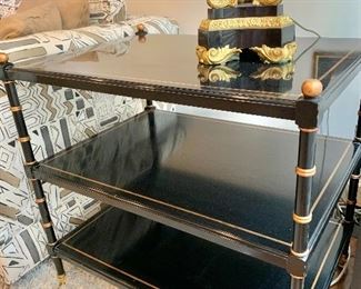 $295  Three-tier black lacquer table with gold accents -  26.5" H, 28" W, 20" D.