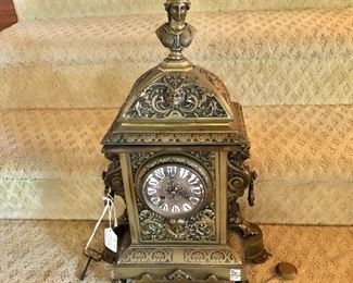 $1200   Decorative metal mantel clock.  24" H, 15" W, 9" D. 