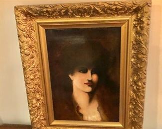 $450   Female portrait framed, oil on canvas 21" H x 16" W. 