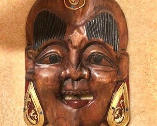 $40 wood mask with large earrings 