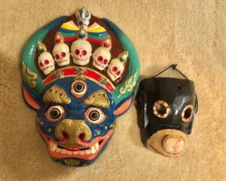 $40 ea  mask Left: 11" H, 8.5" W.  Right: 5.5" H, 4.25" W. 