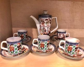 $110 porcelain tea set.  Pot 8" H. 