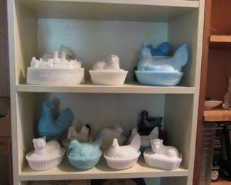 Candy dishes, chicken on the nest and other rare ones, including blue milk glass.