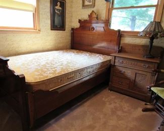 Eastlake bed and antique chest