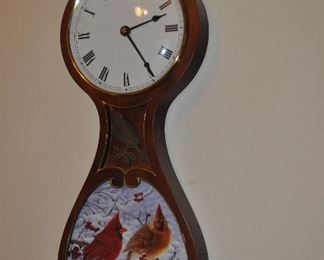 Banjo clock with pair of cardinals