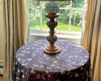 Table with Custom Silk Tablecloth                                                    Decorative Lamp