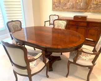 Oval dining table (center pedestal), 6 Italian-made arm chairs (table and chairs priced separately)