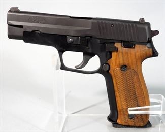 Sig Sauer P226 9mm Para Pistol SN# 0U192646, With 2 Total Mags, Leather Holster, Extra Grips And Paperwork, In Box