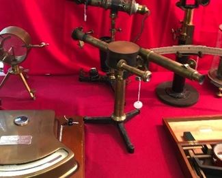 So many fascinating antique brass scientific instruments