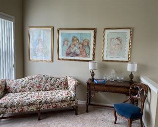 Single cushion loveseat, 3 framed Hibel prints, vanity desk with single drawer, matched set of lamps and armchair in excellent condition