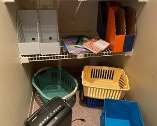 Plastic bins and office supplies