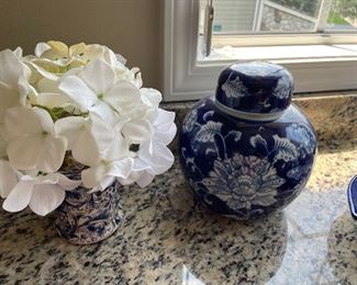 Blue and white ginger jar and silk floral