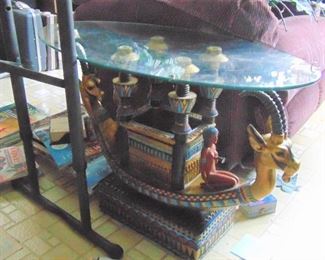 You can "Walk Like and Egyptian" with this cool resin table, modeled after a Nile Boat found in King Tut's Tomb.