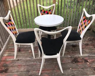Formica topped cast iron base  table and 4 Fabulous MCM chairs . Harlequin upholstered velvet