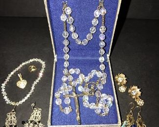 rosary aurora borealis , pierced earrings , charms