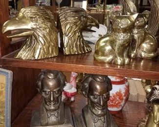 Book ends. Brass eagles, cats, ducks and geese. Cast Lincoln
