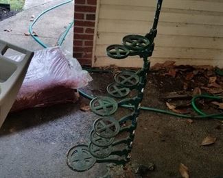 antique iron plant stand