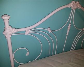queen bed with metal headboard
