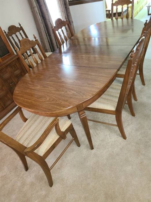 Dining table 58 x 42 includes three 10" leaves and 8 chairs