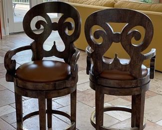 Set of 4 swivel bar stools with leather seats and brass footplates. Madonna owns the same exact set!