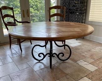 Collection Reproductions oak pedestal dining room table with star pattern and cast iron scroll base. Measures 60" D. Photo 1 of 4. 