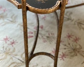 Dennis & Leen ebony with gilt trim cocktail table with gilt faux bois base and crackle finish. Measures 48" x 48" x 20" H. Photo 2 of 3.