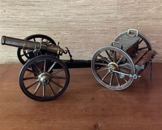 Miniature cannon figurines. 