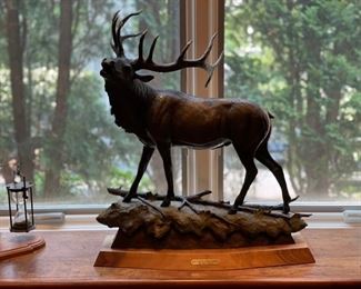 Autumn's Challenge Elk bronze. By Chris Navarro. Measures 23" W x 26" H. 