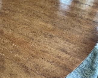 Dennis & Leen oval dining room table. Measures 60" L x 52" W.  Extends to 96" L with two 18" W leaves. Table is 29" H with a 2.5" apron. Photo 2 of 3. 