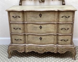 Three drawer dresser. Painted a distressed light green. Measures 47" W x 21" D x 36"H. 