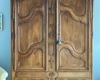 Mike Bell French provincial oak armoire with brass detailing. Measures 63" W x 23" D x 91" H. Photo 1 of 4.