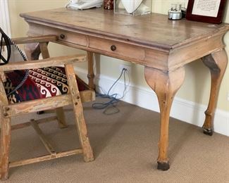 Pine desk with hand-carved faux deer legs. Measures 50" W x 27" D x 30" H. Photo 1 of 2. 