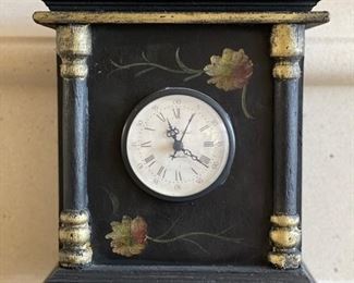Decorative battery-operated mantle clock. 