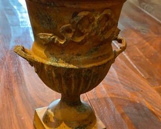 Vintage metal urn. Measures 9" x 5". 