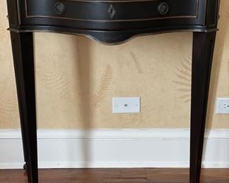 Sligh Furniture ebony side table. Measures 32" W x 18" D x 32" H. 