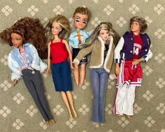 Vintage Ken and Barbie dolls.