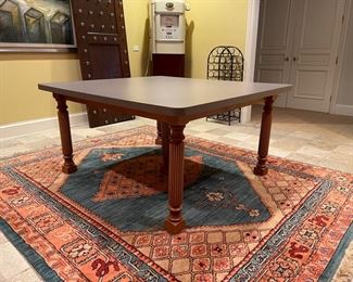 Laminate top beer pong table. Persian Rug and vintage Persian Rug. 