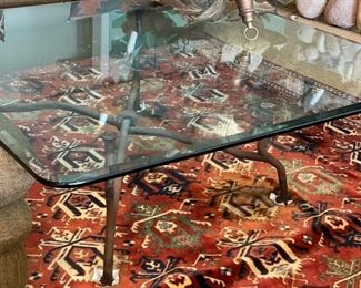 Glass top wrought iron cocktail table. 