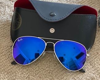 Ray Ban mirrored sunglasses. 