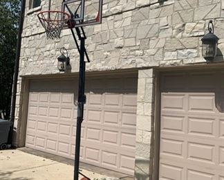 Adjustable & portable basketball hoop.