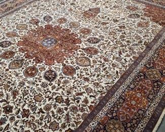 Beautiful Persian Kashan rug is tightly woven fine wool. The rug is massive in size as it measures 10'2" x 15'9". Pet free and smoke free home. The rug is approximately 50 years old and in great shape. In 1996, the rug was appraised by Alborz Oriental Rugs of Atlanta for $26,900 (see image in photo gallery). This auction lot has a reserve price of $2,000. What a deal!